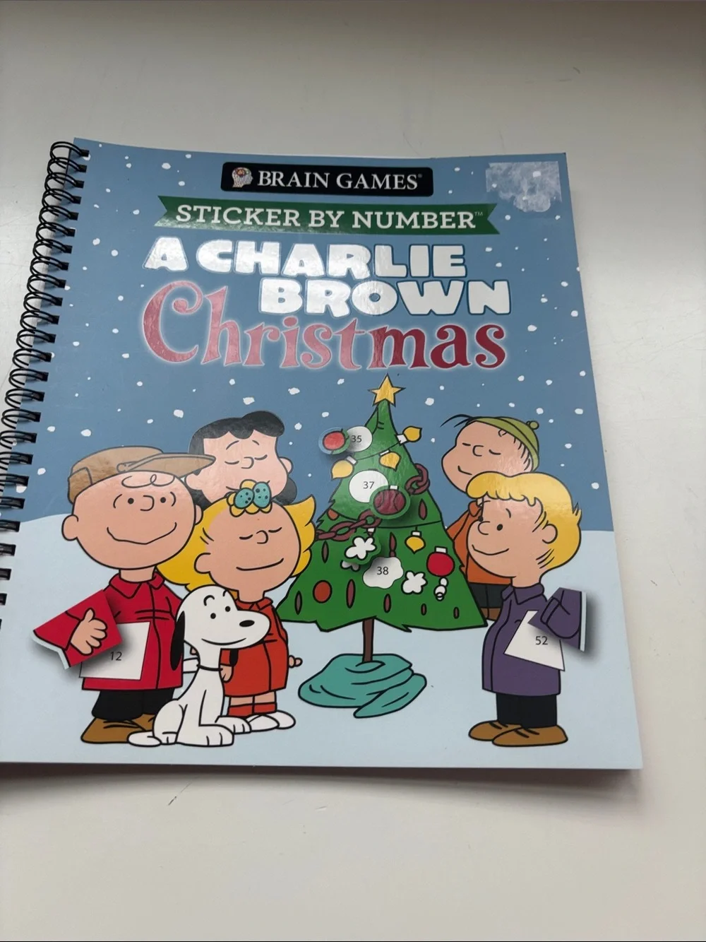 CHARLIE BROWN new Brain Games sticker by number book